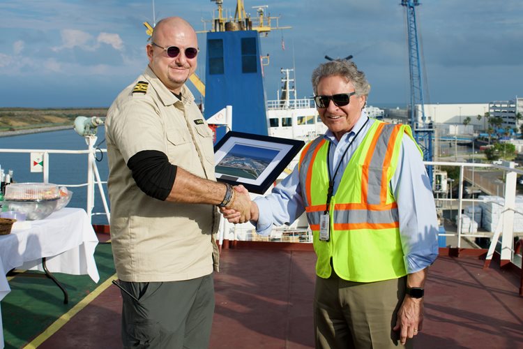 Port Canaveral CEO, Capt. John Murray presents welcoming plaque to Bulk Valor Capt. Enver Akcora aboard the bulk carrier Bulk Valor