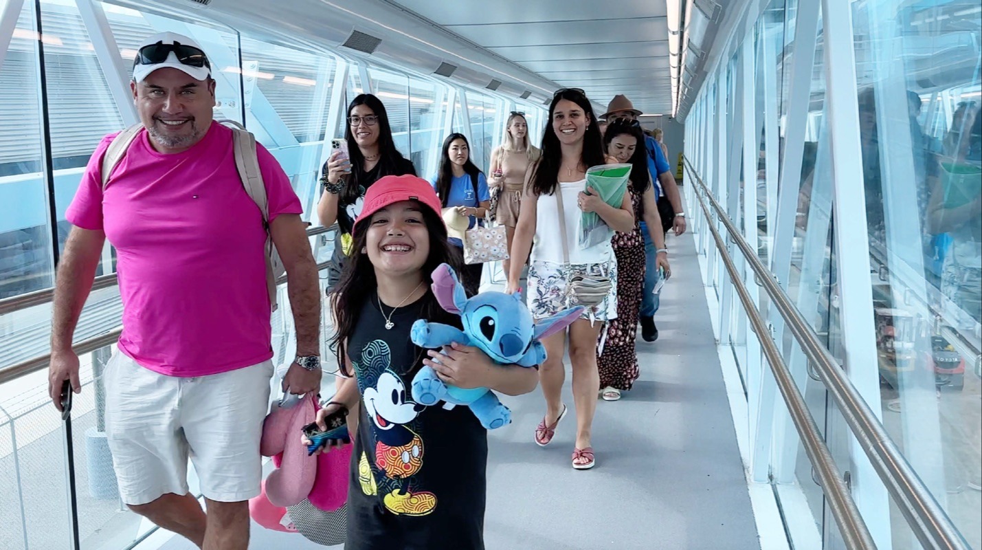 Photo of Happy cruise passengers embarking their ship at Port Canaveral